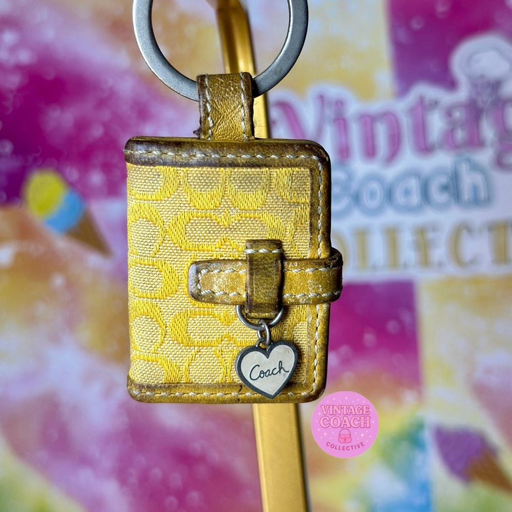 Sold on eBay do not buy 
Project photo album Coach yellow key chain